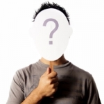 man holding question over face